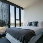 Parque Melbourne apartment - bedroom overlooking pool
