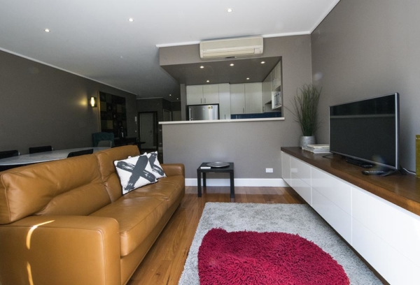 East Melbourne 1 bedroom apartment - lounge and tv