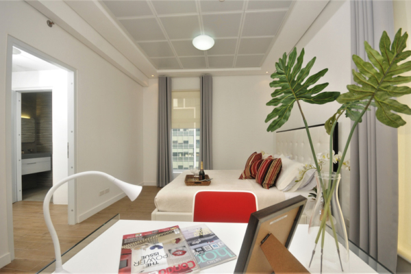 Dexerton Residences Apartment - bedroom and desk