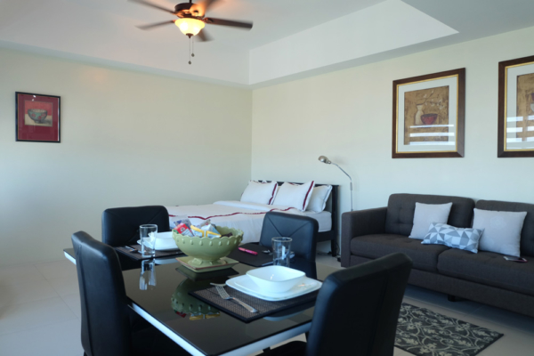 Icon Plaza Studio Apartment - BGC - bed, lounge and dining