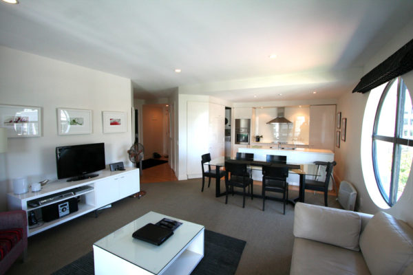 Auckland Viaduct Harbour 2 bedroom apartment - lounge, dining and kitchen