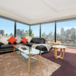 Eureka Tower apartment - living room and view of Melbourne CBD