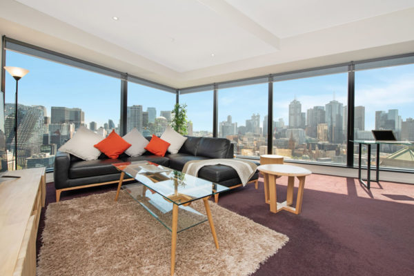 Eureka Tower apartment - living room and view of Melbourne CBD