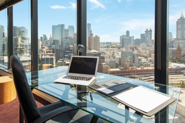Eureka Tower apartment - study desk with a view of Melbourne city