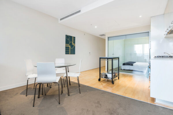 Atlantis - Melbourne apartment - dining and bedroom