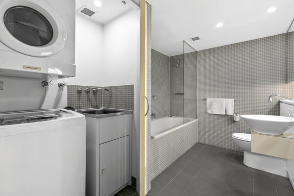 Shelley St, Sydney - apartment 407 laundry and bathroom
