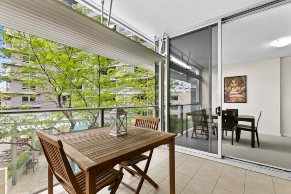 Shelley St, Sydney - apartment 407 balcony with outdoor table and chairs