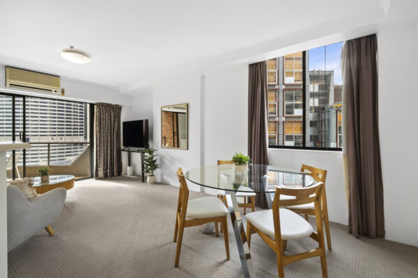 York Street, Sydney apartment 1208 - dining table and living room