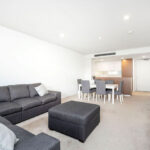 Queens Riverside - QII apartment 107 - living room and dining