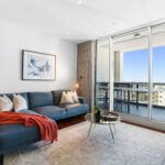 QT Apartments, Perth - apartment 1706 living room and balcony