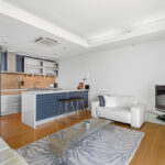 Condor Towers, Perth. Apartment 100 - kitchen and living area