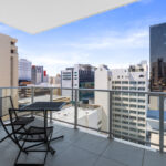 Condor Towers, Perth. Apartment 100 - balcony with a view of Perth CBD