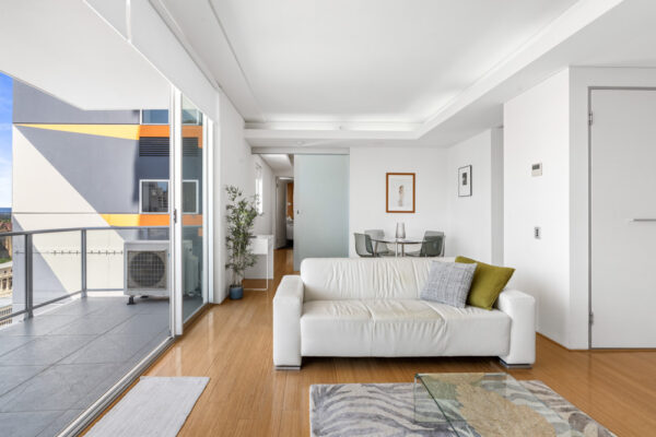 Condor Towers, Perth. Apartment 100 - living room and balcony