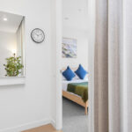 LIV Aston apartment, Melbourne, entry and bedroom