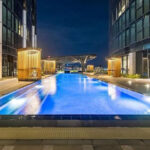 Melbourne Square apartments, Southbank - outdoor pool at night